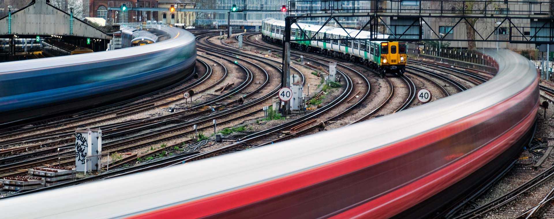 Multiple trains on tracks.